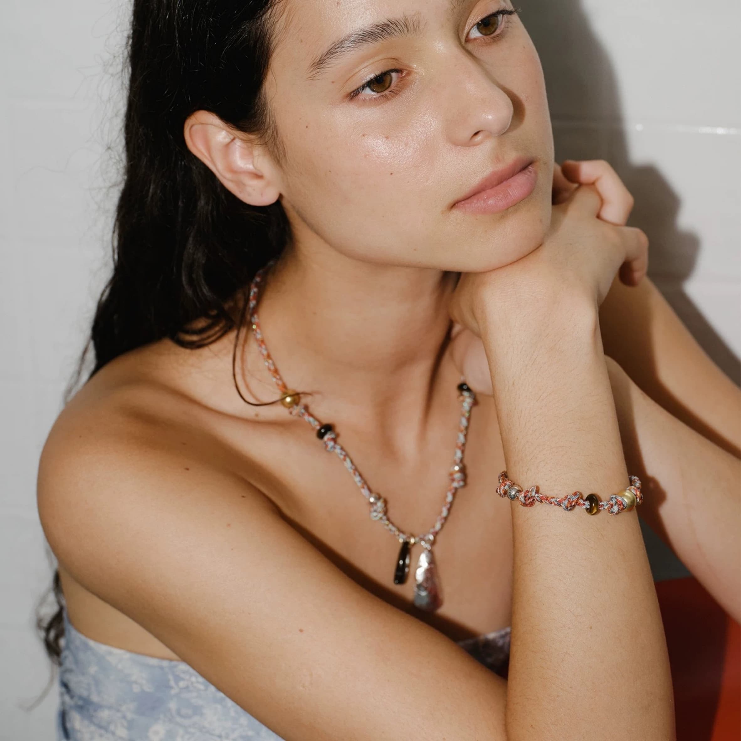 Woman wearing a colorful beaded necklace – bohemian chic jewelry for everyday style