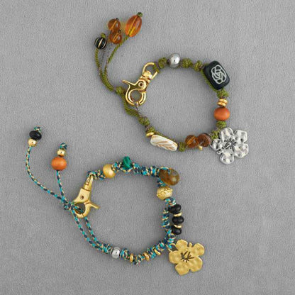 سوار سحر زهرة الكركديه مصنوع يدويًا - حبل بوهو مضفر من الخرز، قابل للتعديل، متوفر بخيارات ذهبية وفضية 