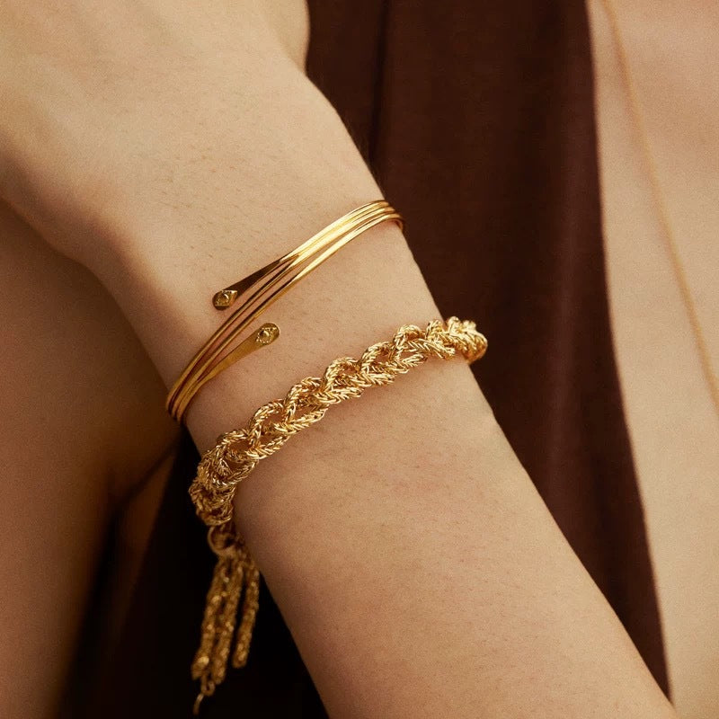 Gold rope chain bracelet on model wrist, twisted rope design fashion bracelet with boho vintage style
